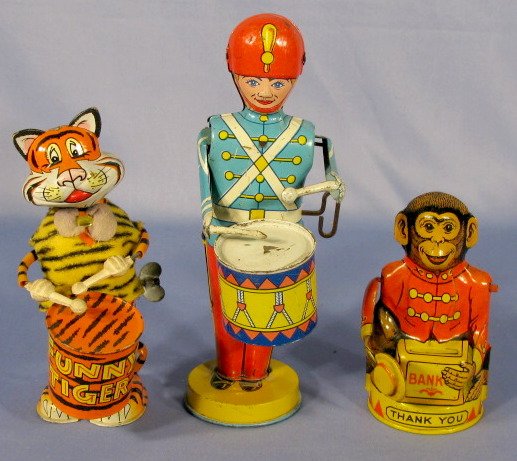 3 Tin Litho Mechanical Key Wind Toys: 3 Tin Litho Mechanical Key Wind Toys: 1.) Chein Drummer, 8" 2.) Japan :Funny Tiger" drummer. 3. Chein Monkey "Bank, Thank You.", 5" All items sell As Is, Where Is, no guarantees of any kind. We accept