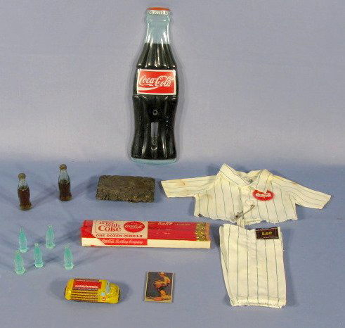 Coca Cola Collectibles inc. Buddy Lee Clothes: Group of Coca Cola Collectibles: 1.) Buddy Lee Uniform, unused, but soiled top. 2.) Lin Mar tin coke truck 3.) 1 dozen pencils in wrapper 4.) Mini green plastic bottles 5.) 2 old glass mini bottles, 1