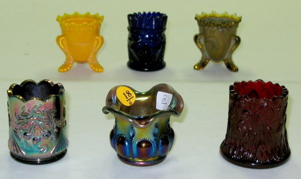 6 Toothpick Holders Including Carnival & St.Clair: 6 Toothpick Holders Including Carnival & St.Clair: 1.) Carnival glass cherries pattern toothpick 2.) Carnival glass beaded oval pattern toothpick 3.) Red glass tree stump pattern toothpick 4.) St. Cla