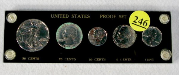 Coins - Dated 1943 Coins in a Proof Holder: Coins - Dated 1943 Coins in a Proof Holder: proof sets were not issued in 43. The coins 1? to 50? all shine like mirrors and the cent and quarter have green corrosion looking stuff on the edges. We ar