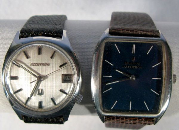 2 Bulova Accutron Wrist Watches: 2 Bulova Accutron Wrist Watches: 1.) Stainless steel, serial no.C11752, circa 1972. Silver dial, hands and markers with a day wheel at the 3. Battery operated, numbered 218D inside. Not tested. 2.) Se