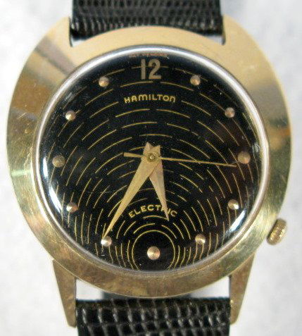 Hamilton 14K Electric Spectra Wrist Watch: Hamilton 14K Electric Spectra Wrist Watch: all black and gold dial. These are estate watches that have been stored for up to 30 years; we found them in drawers and cabinets throughout the Chandler hom