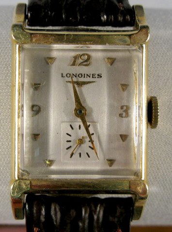Longines 17J 14K Wrist Watch: Longines 17J 14K Wrist Watch: silver dial with gold hands, seconds bits and numbers 3, 9, & 12. Engraved back dated 1953. Running at this time. These are estate watches that have been stored for up to