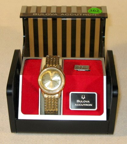 Bulova Accutron Cal 214 Pulsation Wrist Watch: Bulova Accutron Cal 214 Pulsation Wrist Watch: in its own plastic display case. The stainless steel and gold filled case is numbered K15902, circa 1966. Nice looking, not tested. These are estate watc