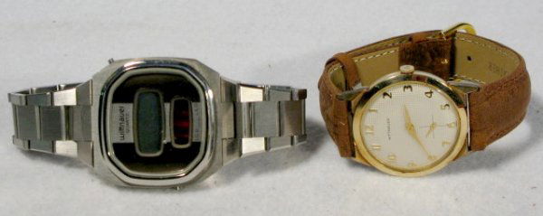 2 Wittnauer Wrist Watches: 2 Wittnauer Wrist Watches: 1.) LCP-LED Quartz, it has a red and a clear dial and is stainless steel. Not tested. 2.) Stainless steel and RGP case, very thin with a textured white dial and gold feature