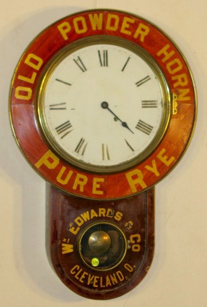 Seth Thomas Advertising Wall Clock: Seth Thomas Advertising Wall Clock: Old Powder Horn Pure Rye, Cleveland, OH. Time only, pendulum, 8 day. Not tested. (1 hand is gone.) 27" x 18" All items sell As Is, Where Is, no guarantees of any ki