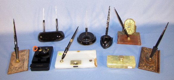 8 Pen Holders & a Blotter: 8 Pen Holders & a Blotter: 1.) 2 Siraca wood pen holders with fish motif. Maker unkown. A Sheaffer & parkette pen is with them. 6" x 3 3/4" (One is faded.) 2.) Dunlop black glass with red and black pe