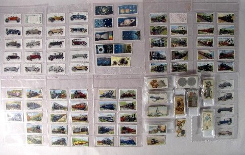 English & Other Cigarette Cards: English & Other Cigarette Cards: Gallaher Ltd. Set of 48 showing and describing early trains; W.D. & H Howills, 2 showing astronomy related subjects; Lambert & Butler showing old cars; the rest, appro