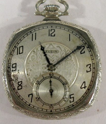 Elgin 17J 12S Grade 345 OF Pocket Watch: Elgin 17J 12S Grade 345 OF Pocket Watch: serial #30630601, 4 sided star, 14K white gold filled case. (The dial is discolored.) 1 3/4" wide and running at this time. All items sell As Is, Where Is, no 