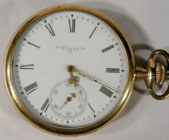 Elgin 7J 16S Grade 210 OF Pocket Watch: Elgin 7J 16S Grade 210 OF Pocket Watch: 1904, serial #10075976, Philadelphia 20yr case, sidewinder with fancy hands. (Dial damage at the 11, case wear & dents on the back.) 1 15/16" wide and running a