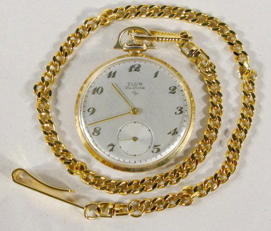 Elgin 542 Deluxe 17J 14K OF Pocket Watch: Elgin 542 Deluxe 17J 14K OF Pocket Watch: 6 adjustments, presentation. Serial no.P946042. "Presented By Ford Motor Co. to David Swanson 35th Anniversary 1914-1954 Henry Ford II". In a yellow snap on K