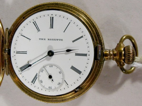 The Rosette 11J 6S HC LS Pocket Watch: The Rosette 11J 6S Pocket Watch: Elgin copy, serial #119341, Bayer-Pretzfelder & Mills, 15 Maiden Lane, New York, NY, hunting case, lever set. (Bezel is missing, case dents & scratches.) 1 11/16" wide