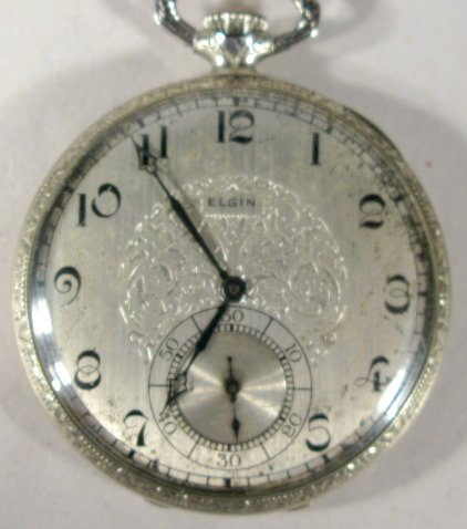 Elgin G.M. Wheeler 17J 12S Grade 452 Pocket Watch: Elgin G.M. Wheeler 17J 12S Grade 452 Pocket Watch: streamline 1923, serial #25035247, in a white gold filled Wadsworth 25yr case. (Case scratches.) 1 3/4" wide and running at this time. All items sell
