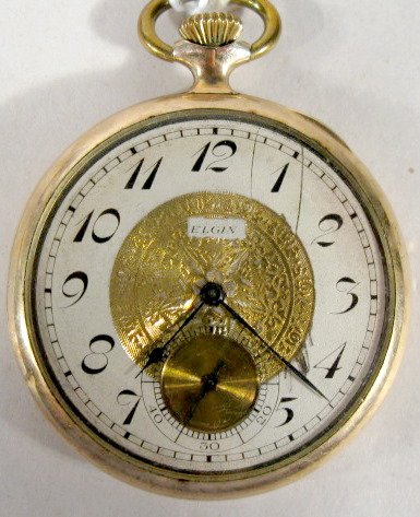 Elgin Dictator 7J 12S Grade 303 Pocket Watch: Elgin Dictator 7J 12S Grade 303 Pocket Watch: serial #26840028, open face, Wadsworth 20yr case, double sunk engraved dial. (Dial scratches.) 1 13/16" wide and running at this time. All items sell As I