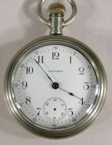 Waltham 7J 18S Grade 18 Model 83 Pocket Watch: Waltham 7J 18S Grade 18 Model 83 Pocket Watch: serial no.14321248. Tip up works. (No seconds hand.) 2 1/4" wide and running at this time. All items sell As Is, Where Is, no guarantees of any kind. We 