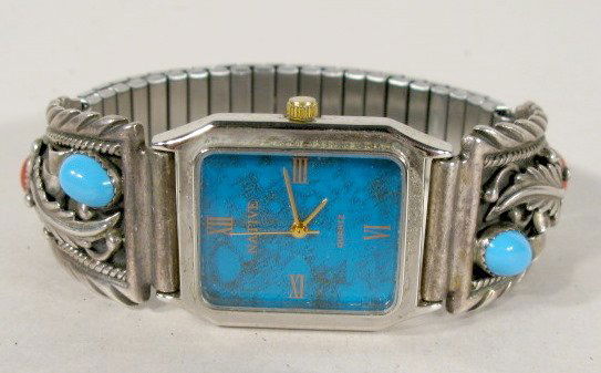 Native Quartz Wrist Watch w/Turquoise: Native Quartz Wrist Watch: with sterling, turquoise and coral band. All items sell As Is, Where Is, no guarantees of any kind. We accept Mastercard & Visa, no paypal, no personal checks, no money orde