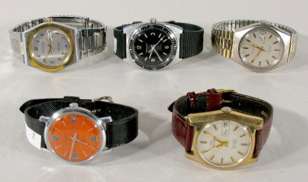 5 Bulova Caravelle Wrist Watches: 5 Bulova Caravelle Wrist Watches: 1.) 3 Electrotime Set-O-Matic with day and date. 2.) Caravelle water resistant, orange dial. 3.) Diver's watch with seconds bezel. All items sell As Is, Where Is, no