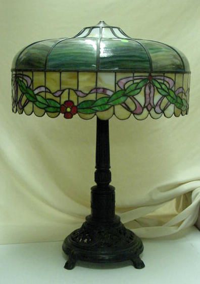 Bent Slag Glass Table Lamp with Florals Brass NR: Please see the hundreds of other quality antiques in this sale Bent slag glass table lamp with florals on ornate brass base; marked "L&L WMC" - married (One of the light upper panels with crow's foot