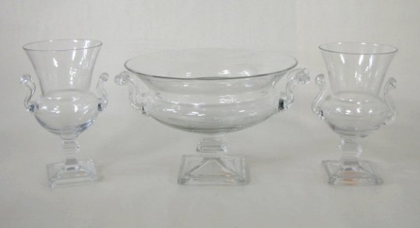 Steuben Style 3pc Clear Glass Console Set: Steuben Style 3pc Clear Glass Console Set: bowl and 2 vases. All 3 pieces have square feet and applied handles. No condition problems. Bowl-6" t x 8 1/8" w; Vases-6 1/2" t All items sell As Is, Where 