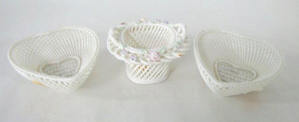 2 Belleek & 1 Donegal Lattice Baskets: 2 Belleek & 1 Donegal Lattice Baskets: 1.) The Belleek pieces are heart shaped with applied marks. 1 5/8" x 4 1/4", no condition problems. 2.) The Donegal basket with applied and painted floral décor