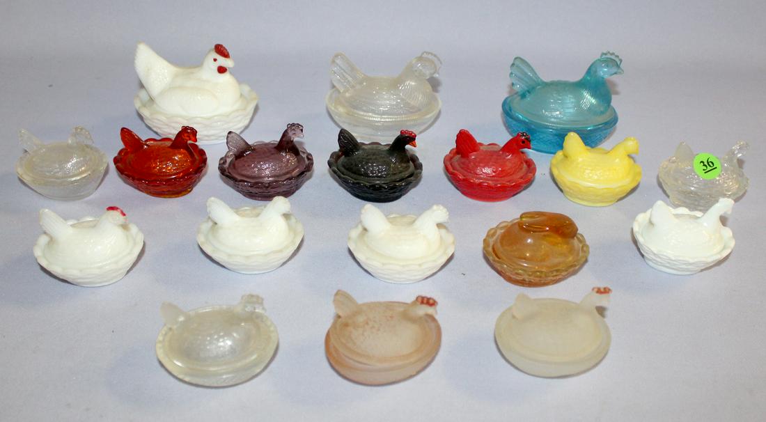 18 Miniture Hens on Nest Glass Dishes. 3- Marked B for: 18 Miniture Hens on Nest Glass Dishes. 3- Marked B for Boyd a pink rabbit & red hen; purple hen. 5- Marked W for Westmoreland, 3 Milk glass hen, a yellow painted milk glass hen, a red painted milk gla