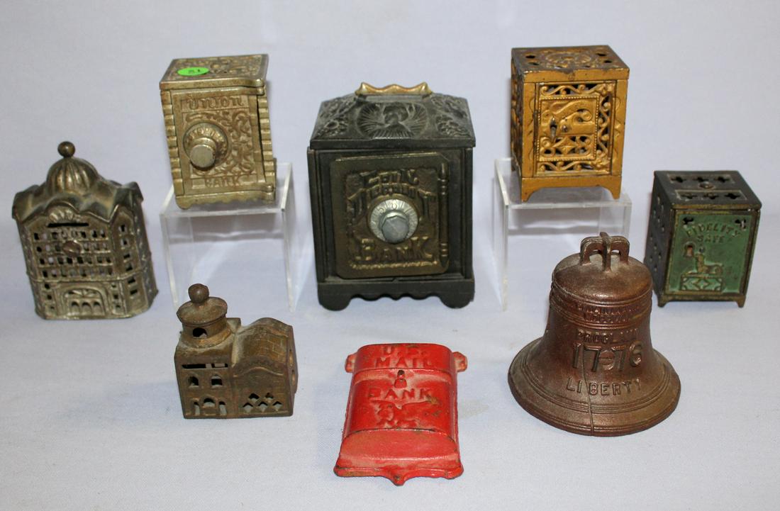 8 Antique Cast Metal Penny Banks. 1.) "This Old Liberty: 8 Antique Cast Metal Penny Banks. 1.) "This Old Liberty Bell" appears original. Unmarked Grey Iron Co. 2.) "US Mail, Unmarked A.C. Williams. 3.) "Coin Desposit Bank" marked made in USA. 4.) "Union Ban