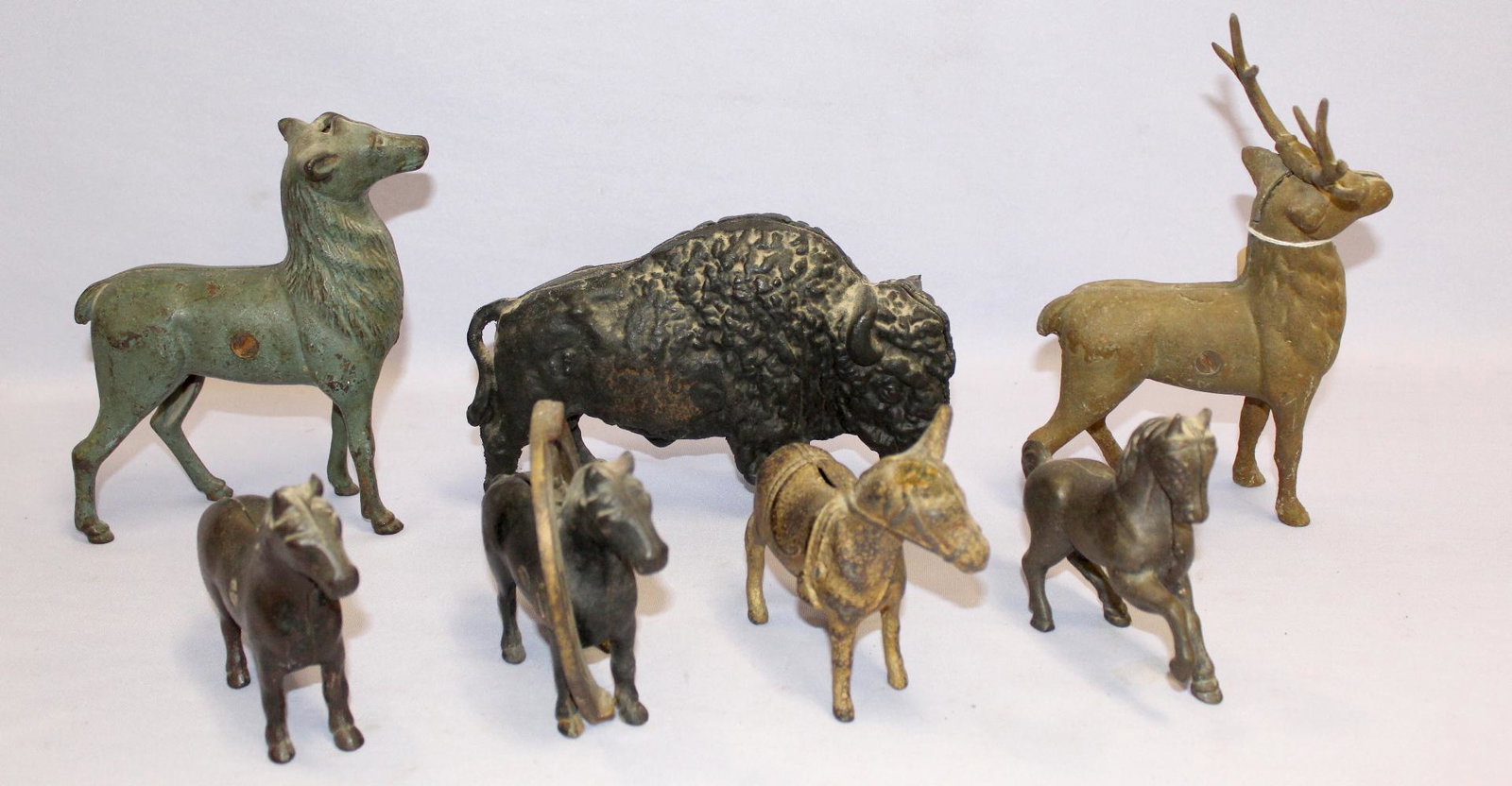 7 Cast Iron Still Banks, 6 Antique. 1.) Buster Brown &: 7 Cast Iron Still Banks, 6 Antique. 1.) Buster Brown & Tige, Archade "Good Luck Horseshoe" some original paint. 2.) "Beauty" Arcade, paint looks original. 3.) "Prancing Horse," Canadian. Small amount 
