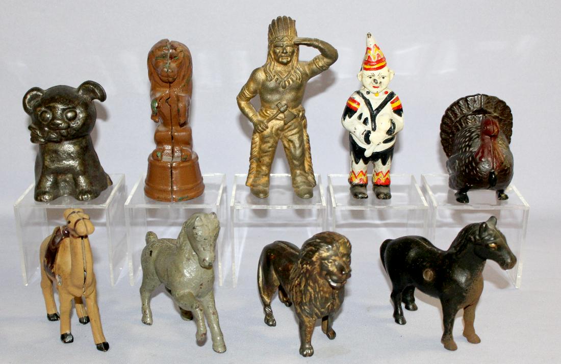 9 Cast Iron Still Banks Antique. 1.) Prancing Horse,: 9 Cast Iron Still Banks Antique. 1.) Prancing Horse, Canadian. Repainted. 2.) Saddle Horse, A.C Williams (2/3's original paint). 3.) Cutie dog; Hubley. No paint. 4.) Turkey; AC Williams. 5.) Lion, tai