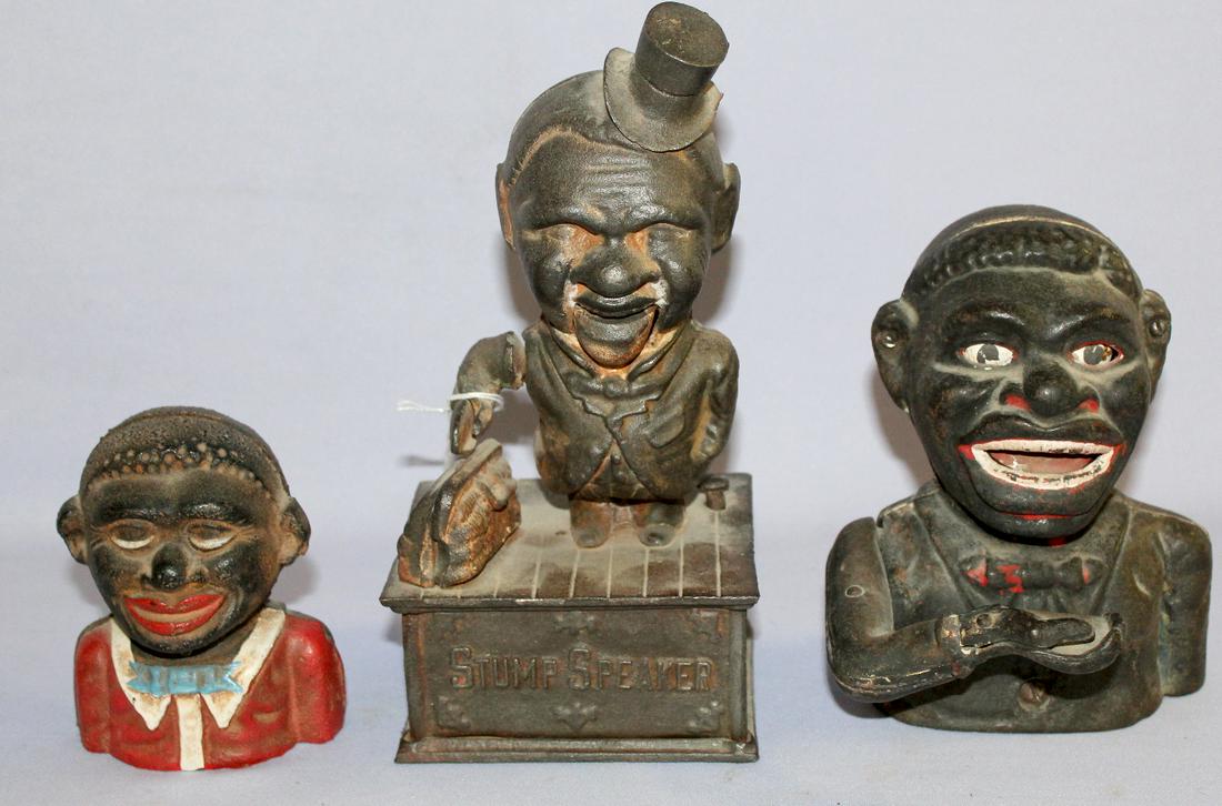 3 Cast Iron Ethic Black Banks. 1.) "The Jolly Nigger: 3 Cast Iron Ethic Black Banks. 1.) "The Jolly Nigger Bank," worls. Paint very worn, some screws replaced. 2.) "Stump Speaker Bank", not working. Paint very worn; no closure; some small chips. 3.) "The