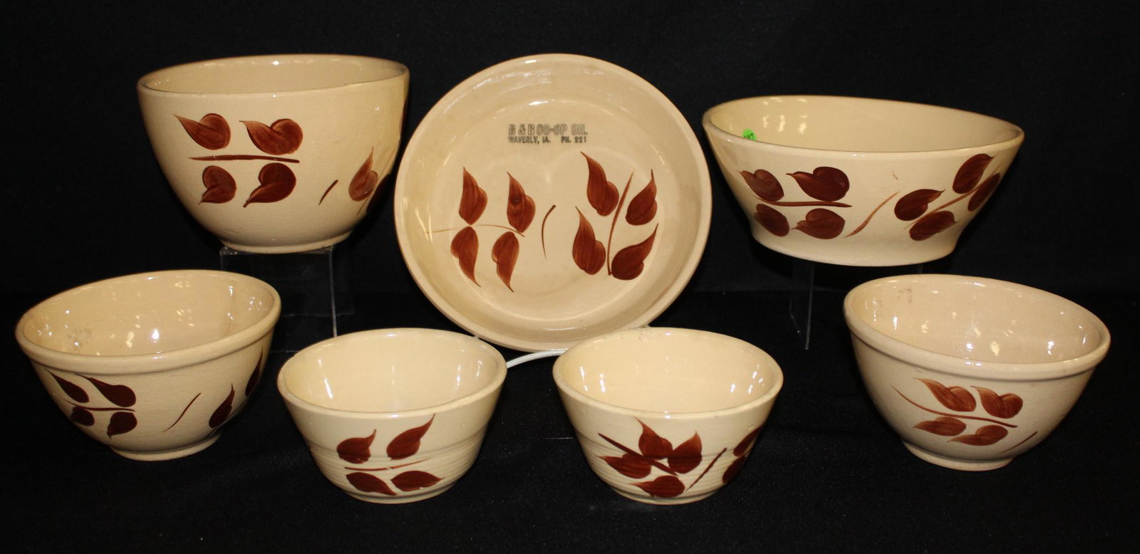 7 Watt Pottery Autumn Foliage Collectibles. 1.) Baker,: 7 Watt Pottery Autumn Foliage Collectibles. 1.) Baker, #119 no lid. 2.) Pie dish, #33 advertising "B&B Co Op Oil Waverly, IA Ph. 221" 3.) 2 Deep mixing bowls, #64 & #63 (63 has a hairline crack). 4.) 
