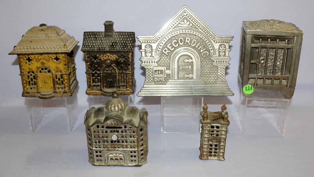 6 Antique Cast Iron Still Banks. 1.) Roof "Bank" J&E: 6 Antique Cast Iron Still Banks. 1.) Roof "Bank" J&E Stevens (Center bolt replaced). 2.) Domed "Bank: A.C Williams (Front bolt replaced). 3.) Roof "Bank" Grey Iron casting Co. (Bolt replaced). 4.) Sky