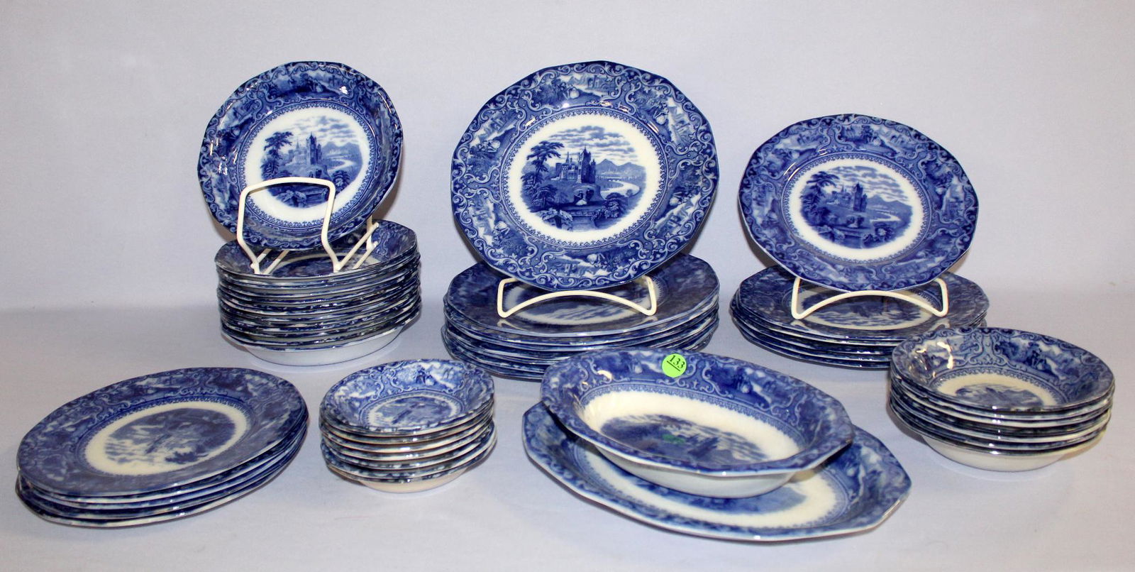 48 PC Flow Blue Dinnerware Set, "Matteau" Pattern. 8: 48 PC Flow Blue Dinnerware Set, "Matteau" Pattern. 8 dinner plates; 6 luncheon plates; 5 salad plates; 14 soup bowls; 7 large sauces; 8 small sauces; 1 open veg; 1 11" platter. Marked Matteau Stafford