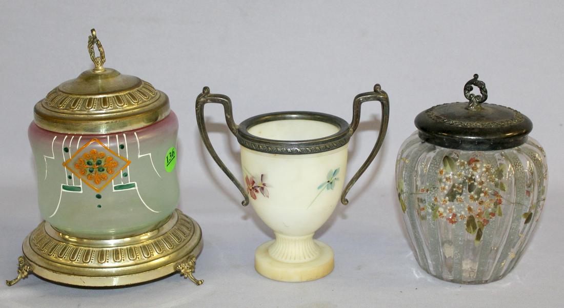 3 Antique Art Glass Collectibles. 1.) Unsigned: 3 Antique Art Glass Collectibles. 1.) Unsigned Pairpoint vase #2005, urn style with metal handled frame, painted with flowers. 2.) Pickle castor with Art Deco painted desing, unmarked silvered tin bas