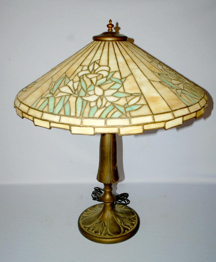 Vintage Electric Table Lamp With Floral Shade. Metal: Vintage Electric Table Lamp With Floral Shade. Metal decorative base; 2 socket, pullchain lamp with plastic slag paned floral shade. Not antique. 27"T with 22" Dia Shade.