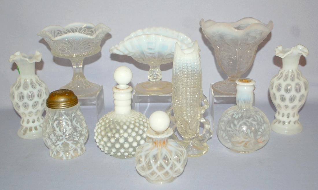 10 White Opalescent Glass Collectibles. 1.) Spanish: 10 White Opalescent Glass Collectibles. 1.) Spanish lace muffineer/shaker. 2.) Ear of corn vase. 3.) Pair of fenton coin spot or dot vases. 4.) Pattern glass bull's eye & fan small compote. 5.) Patter