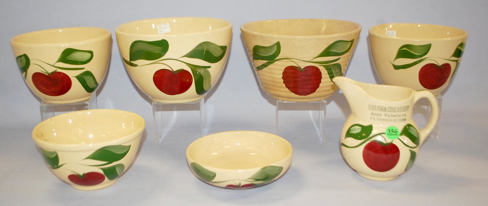 7 Watt Pottery "Apple" Advertising Tableware: 7 Watt Pottery "Apple" Advertising Tableware Collectibles: 1.) Milk pitcher, #15 "Kalona Creamery, Arch Huberman" 2.) Cereal/salad bowl, #94 "Compliments Max's Produce" 3.) Mixing bowl, #6 "The R. & B