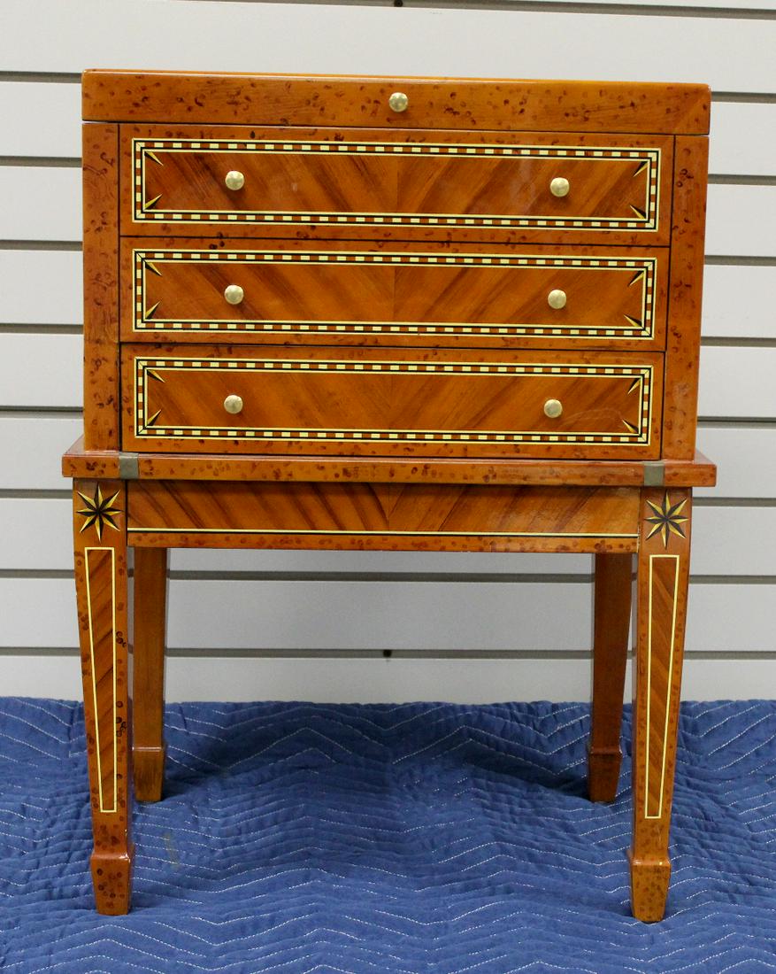 Laminated Wood Cigar/Tobacco Lift top Cabinet: Laminated Wood Cigar/Tobacco Lift top Cabinet: the lift top lid opens to a removable aeriated tray that lifts out to show a deeper 2 section area. This all wood lined; there is a lower drawer with fau