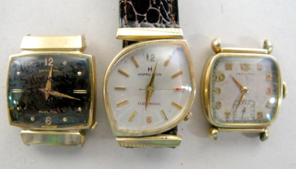 Group of 3 Hamilton Wrist Watches: Group of 3 Hamilton Wrist Watches: 1.) Electronic, Model 505, adjusted, Victor II model case, 10K gold filled. Not tested. 2.) Gold filled with black dial, gold hands, numbers and markers. Numbered 50