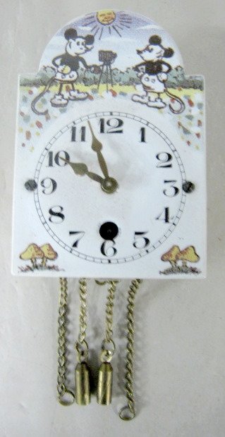 Pendulette w/Mickey Mouse Like Figures: Pendulette w/Mickey Mouse Like Figures: the sun shines as one mouse photographs the other. No makers info found this novelty clock. (There is no pendulum, it does wind ok, can't tell if it will run or