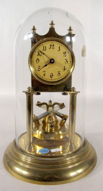 German Rotary Pendulum w/Mercury Clock: German Rotary Pendulum w/Mercury Clock: under a glass dome, it is marked DRGM484408-DRGM502714, Made in Germany. The pendulum is unusual, it has 2 glass tubes with live mercury setting at about 45 deg