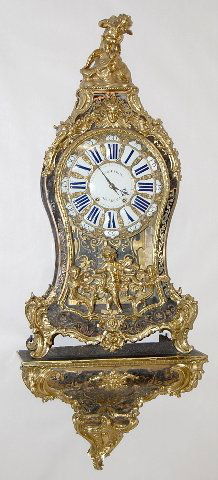 Godefroy-A Bordeaux Boulle Style Clock: Godefroy-A Bordeaux Boulle Style Clock: time and half hour striking with a 12" dial. A matching shelf is with this dore fitted case with brass and shell inlaid body. The movement has a large incised s