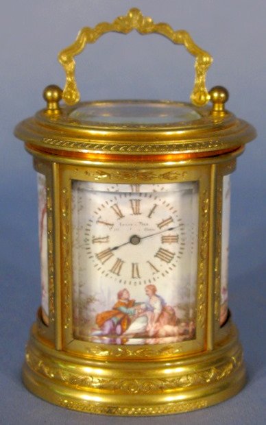 LeRoy Paris Oval Bronze & Enamel Carriage Clock: LeRoy Paris Miniature Oval Bronze & Enamel Courting Scene Carriage Clock: the enamel dial is marked "LeRoy et Fils and address 114 ells Palais Royal; movement marked Aiguilles; also marked with serial