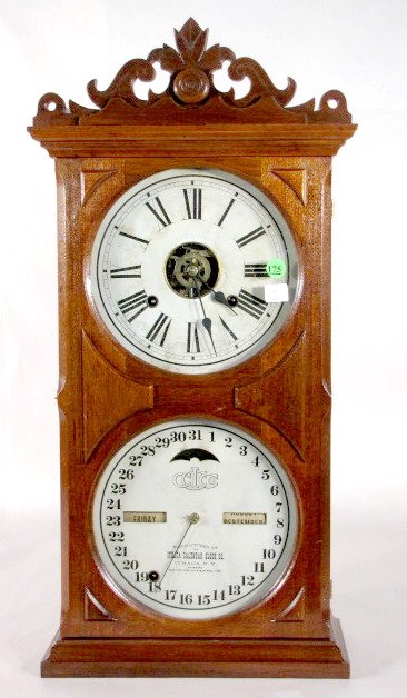 Ithaca No.10 Farmers Calendar Clock, Walnut: Ithaca No.10 Farmers Calendar Clock, Walnut: with 2 8" dials and an 8 day time and strike movement. (Both dials have some staining. The wood finish may have been redone, but it was a proper job. The c