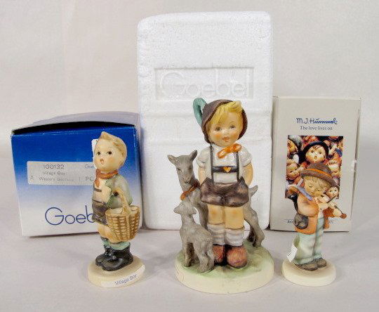 3 Hummel Figurines: Goat Herder, Fiddler, Boy: 3 Hummel Figurines: 1.) No.200/0 Little Goat Herder, 4 1/2" tall. 2.) No.2 4/0 Little Fiddler, 3" tall. 3.) No.51 3/0 Village Boy, 3 3/4" tall. There is a box or container for each in this lot. All it