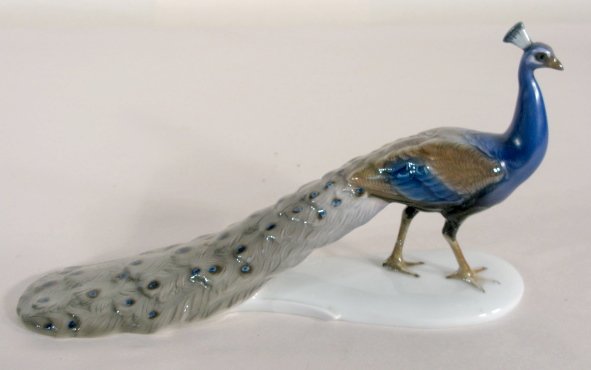 Rosenthal Porcelain Peacock No. 948: Rosenthal Porcelain Peacock No. 948: he is colorful with very long tail feathers, bright blue neck and breast. Handgemalt B, included in the green stamp. Impressed no.948. No condition problems. 5" x