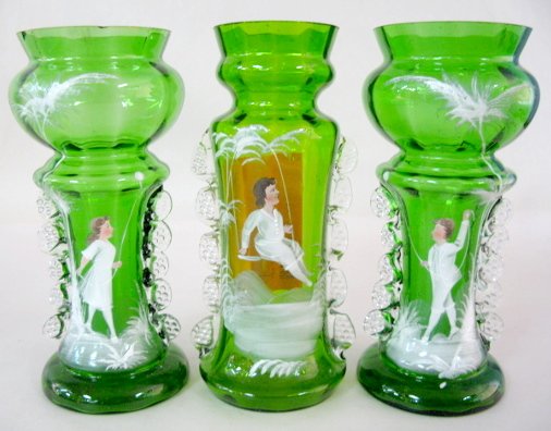 3 Mary Gregory Style Green Glass Vases: 3 Mary Gregory Style Green Glass Vases: all have clear rigaree down the sides, also the kids have painted facial features. 2 are with a balloon, 1 with a swing. They are original late 19th century pie