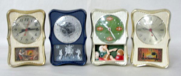 4 Mastercrafters Plastic Wall Clocks: 4 Mastercrafters Plastic Wall Clocks: all electric 1.) Navy blue with silver dial, bottom scene of the moon landing Model No.A-11. The light in the bottom works. (Plastic damage on clock face. Not run