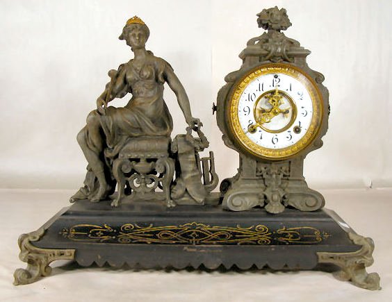 Ansonia "Opera" Statue Clock: Ansonia "Opera" Statue Clock: time and strike; open escapement 16" x 20" All items sell As Is, Where Is, no guarantees of any kind. We accept Mastercard & Visa, no paypal, no personal checks, no money