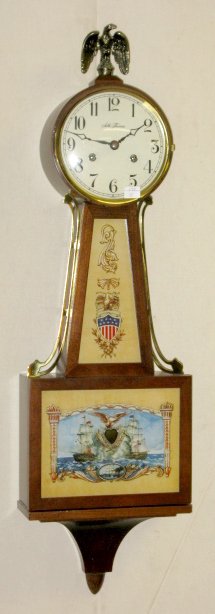 Seth Thomas Banjo Clock by Talley, Ind.: Seth Thomas Banjo Clock by Talley, Ind; 1709 Riverton labels; eagle/shield and clipper ships tablets; time and strike; pendulum No condition problems. Running condition not known. 30" All items sell A