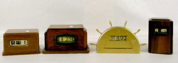 4 Electric Digital Clocks: 4 Electric Digital Clocks: 1.) Barr Mfg. Co., wood case. (Scratched case) 2.) Pennwood deco style wood clock. (Scratched case.) 3.) Metal Tele-Vision Clock Corp. ship wheel Numechron 4.) Warren Telech